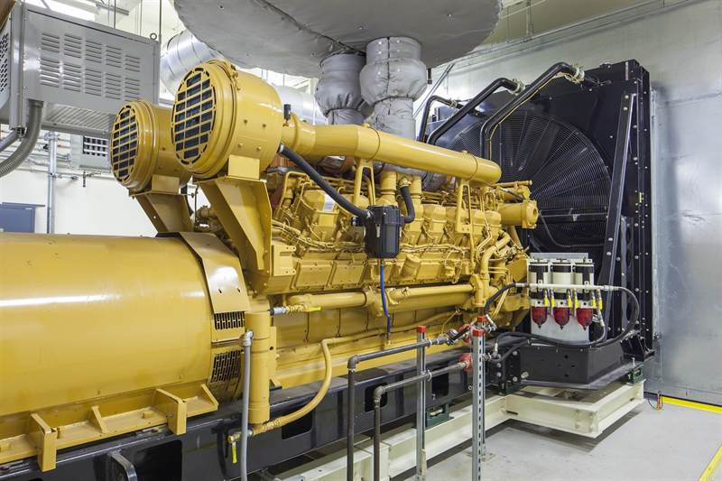 Industrial generator set in a facility power room